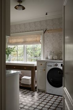 a washer and dryer in a small room