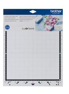 the brother cutting mat is shown in front of a white background with black dots and flowers