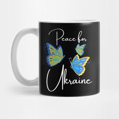 a black mug with two blue and yellow butterflies on it that says peace for ukraine