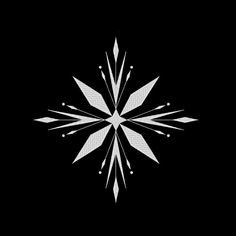 a white snowflake on a black background