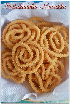 some kind of food that is on top of a paper towel with the words puthukadala murukku