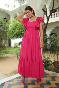 Berry Pink Flared Maxi Dress is a beautiful and stylish choice for women with Indian body type who want to make a statement. With customization options, free shipping, and easy returns, you can shop with confidence and look your best in this stunning dress. Feminine Pink Cotton Maxi Dress, Pink Cotton Ruffle Dress For Summer, Pink Cotton Ruffle Maxi Dress, Pink Cotton Maxi Dress With Ruffles, Feminine Cotton Midi Dress For Party, Feminine Cotton Maxi Dress With Ruffles, Elegant Pink Cotton Midi Dress, Casual Pink Cotton Ruffle Dress, Pink Cotton Ruffle Dress With Ruffle Hem