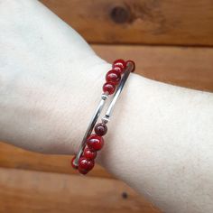 Coil Bangle Bracelet
 	Cranberry Dyed Quartz (semi-precious stone)
 	Silver-plated accents Elegant Red Agate Beaded Bracelets, Elegant Red Agate Bracelets, Elegant Healing Beaded Bangle Bracelets, Elegant Metal Beaded Bracelets With Natural Stones, Elegant Red Gemstone Beads Stretch Bracelet, Elegant Red Stretch Bracelet With Gemstone Beads, Nickel-free Modern Beaded Bracelets As Gift, Modern Nickel-free Beaded Bracelets For Gifts, Adjustable Gemstone Beaded Bracelets For Formal Wear