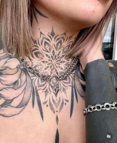 a woman with a tattoo on her chest