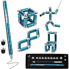 an assortment of blue and silver objects are arranged in the shape of cubes, sticks, and balls