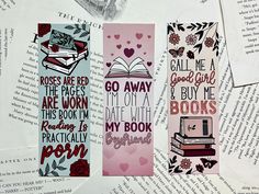 three bookmarks with different designs on them