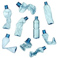 several empty water bottles are shown in this image