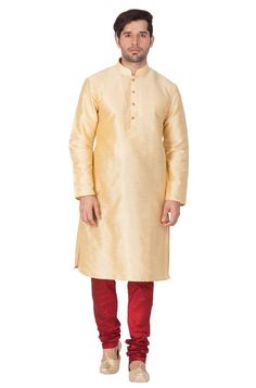 Vastramay brings to you this Stylish yet Comfortable Men Gold Men Cotton Art Silk Solid Kurta and Churidar Pyjama Set. Adorn it for a perfect Classy and Trendy look. Pair it with a juti or a mojari for the Royal look. Product Features :  Top Color: Gold Top Fabric: Cotton Art Silk Product Type: Kurta and Churidar Pyjama Set Product Length: Knee Length Hemline: Straight Fabric Purity: Blended Weave Pattern: Regular Placket: Button Placket Collar: Mandarin Collar Sleeves: Long Sleeves Men's Kurta Pajama, Eid Shopping, Cotton Art, Men's Kurta, Kurta Pyjama, Silk Kurta, Indian Bridal Wear, Royal Look, Dupion Silk