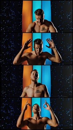 the shirtless man is posing in front of four different colored squares with his hands up