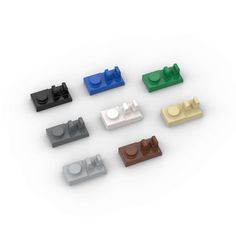 several lego parts are shown in different colors and sizes, including one for the base