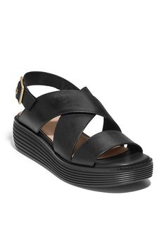 Crafted with modern style and ultimate comfort in mind, the Cole Haan ØriginalGrand Platform Sandals feature criss-cross straps and a functional buckle strap for the perfect fit. | ØriginalGrand Platform Sandals by Cole Haan in Black, Women's, Size: 5.5, Leather/EVA at Anthropologie Modern Cross Strap Sandals With Removable Insole, Cole Haan Women, Shop Fans, Leather Platform Sandals, Cross Straps, Cole Haan, Accessories Branding, Black Fits, Platform Sandals