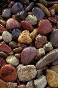 many different colored rocks on top of each other