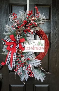 a christmas wreath on the front door