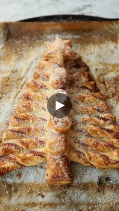 a pastry christmas tree on a baking sheet