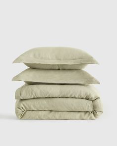 four pillows stacked on top of each other