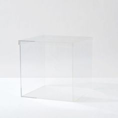 a clear plastic box sitting on top of a white table