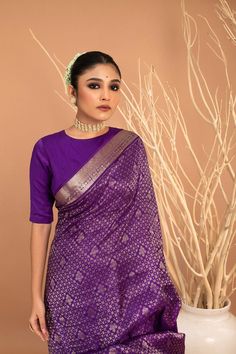 This luxurious Handwoven Pure Zari Silk Kanjivaram saree features a designer pallu crafted with unique Shibori art, offering a sophisticated, exclusive look. Crafted with care, this exquisite saree radiates sophistication and class, creating a stunning statement with subtle artistic elements. Elegant Purple Chanderi Pre-draped Saree, Festive Banarasi Silk Pre-draped Saree With Self Design, Transitional Katan Silk Pre-draped Saree For Wedding, Designer Art Silk Pre-draped Saree With Zari Work, Elegant Purple Tissue Silk Pre-draped Saree, Semi-stitched Pre-draped Saree With Zari Weaving For Navratri, Designer Wear Pre-draped Saree With Self Design For Navratri, Festive Purple Tussar Silk Pre-draped Saree, Elegant Chanderi Choli For Festivals