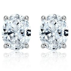 Introducing the newest addition to the Ginger Lyne Collection, 5.08 Ct (2.54 CT each) 10x8mm Oval Cut Solitaire cz Stud Earrings for women, elegantly crafted to capture the essence of sophistication with their exquisite design and exceptional craftsmanship. Each earring features a stunning 10mm Oval shape 8A quality cubic zirconia, showcasing a clarity and brilliance that rivals that of a D color VVS1 Clarity genuine diamond. Set in the finest 14k white gold-plated 925 sterling silver, these ear Earring Hole, Dainty Studs, Solitaire Studs, Small Earrings Studs, Cz Stud Earrings, Stud Earrings For Women, Diamond Set, Small Earrings, Exquisite Design