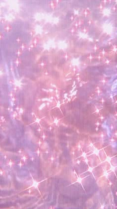 an abstract background with pink and white stars