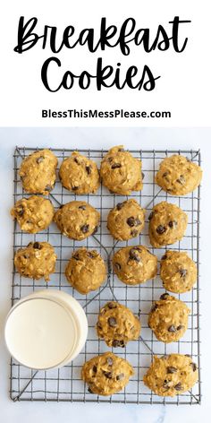 cookies cooling on a wire rack next to a cup of milk