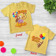 two children's t - shirts with monkeys on them and balloons in the air