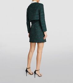 This bold, daring suit combines the classic elegance of tweed with the modern flair of a mini dress. Perfect for those who are not afraid to stand out and make a statement. Elevate your style game with this unique and chic ensemble. Bolero jacket: spread collar, button front closures, long sleeves, attached layered effect shirt, removable Dress: Round neck; zipper closure; three-quarter length sleeves; contrast at top, tweed skirt with fringe trim Dress and jacket set lined Upper main fabric: 95 Skirt With Fringe, Dress And Jacket Set, Dress And Jacket, Dress Suit, Trim Dress, Tweed Skirt, Bolero Jacket, Not Afraid, Fringe Trim