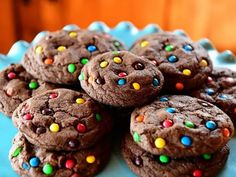 chocolate cookies with sprinkles on a blue plate