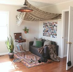 a living room filled with furniture and decor