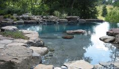 a pool with rocks and water in it