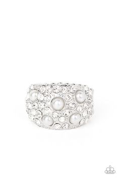 An explosion of dainty white rhinestones and bubbly white pearls are encrusted across the front of a thick silver band, creating a glamorous centerpiece atop the finger. Features a stretchy band for a flexible fit.

 Sold as one individual ring. Gatsby Girl, White Pearl Ring, Stretch Ring, Rhinestone Ring, Paparazzi Accessories, Rings For Girls, White Rhinestone, Paparazzi Jewelry, Pearl Diamond