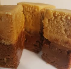 two pieces of cake sitting on top of a white plate