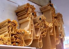 some very pretty wooden decorations hanging on the wall