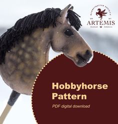 a toy horse with black manes on it's head and the words hobby horse pattern