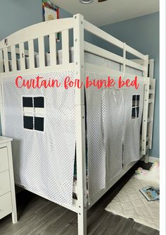 there is a white bunk bed with red lettering on the top and bottom panel that says, curtain for bunk bed