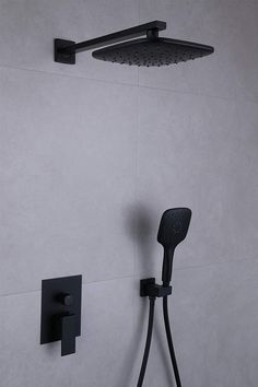 a black shower head and hand held shower faucet