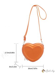 an orange heart shaped purse with measurements for the strap and shoulder length, on a white background