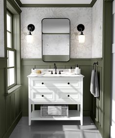 a white sink sitting under a mirror in a bathroom next to a window with green walls