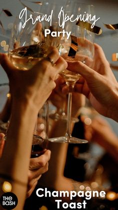 several people toasting wine glasses with confetti in the background