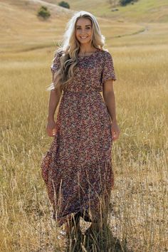 Who doesn't love a fun, floral print? The Maggie dress is perfect for having a picnic with the girls! Modest Dresses For Women, Modest Prom, Modest Bridesmaid Dresses, Red Maxi, Prom Dresses Modest, Prairie Dress, A Picnic, House Dress, Everyday Dresses