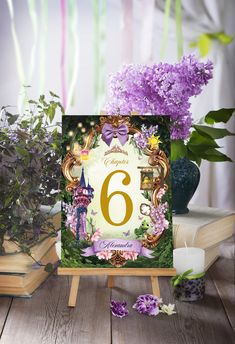 the number six is surrounded by purple flowers