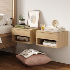 a bed room with a neatly made bed and some books on the shelf next to it