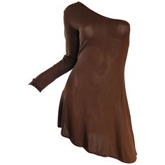 Sexy 1990s ALBERTA FERRETTI chocolate brown one shoulder mini dress / tunic! Simply slips over the head and stretches to fit. Great alone or belted, with jeans, etc. Soft rayon knit fabric looks fantastic on! Also looks great with the pictured brown RIFAT OZBEK lace bodysuit, that is also available in my 1stDibs Shop! In great condition. Made in Italy Marked Size US 12, but stretches to fit smaller or larger Measurements:(plenty of stretch) 34-42 inch bust 28-34 inch waist 36-44 inch hips Pink Jersey Dress, Brown Cami, Chocolate Brown Dress, 1st Dibs, One Shoulder Mini Dress, Italian Dress, Cream Lace Dress, Floral Pattern Dress, Slim Aarons