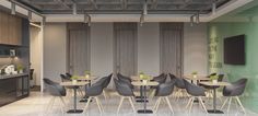 an empty restaurant with tables and chairs in front of a flat screen tv on the wall