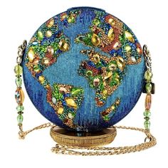 The World Is At Your Fingertips When You Carry This Fully Beaded Globe Handbag That Will Add A Touch Of Whimsy To Any Outfit. 7.75 X 2 X 8.25" Strap Length End To End: 49.75" Strap Drop: 21.75" Non-Removable Crossbody Chain Strap, Magnet Closure, Inside Pocket, Fits A Cell Phone This Is A Handmade Item, Each One An Individual Work Of Art. Slight Variations May Occur. Mary Frances Bags, Mary Frances Handbags, Novelty Handbags, Mary Frances, Novelty Bags, A Cell, Beaded Handbag, Cute Bags, Blue Bags