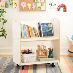 a child's bookshelf with lots of books on it