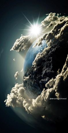 the earth is surrounded by clouds and sun