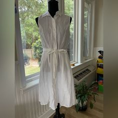 Precious Classic White Linen Sleeveless Shirt Dress. So Cool And Flattering Fitted Sleeveless Summer Dress For Daywear, Sleeveless Summer Midi Dress For Daytime, Summer Sleeveless Midi Dress For Daytime, Fitted Sleeveless Sundress For Daytime, Sleeveless Cotton Sundress For Daywear, Elegant Sleeveless Cotton Sundress, Sleeveless Sundress Midi For Daytime, Sleeveless Sundress Midi Dress For Daytime, White Sleeveless Maxi Dress For Daywear