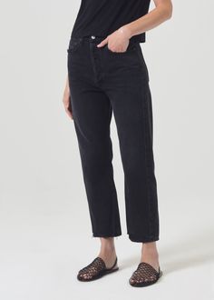 Our best-selling 90's Jean with the much-requested cropped inseam. This decade inspired mid-rise is designed to sit relaxed at the waist with an easy fit through the hips into a classic, loose straight leg. Style back to anything and everything. Crafted in our signature Organic Cotton, this pair will only get softer with each wear.For the full-length version, shop the 90's Jeans. This fit is intended to be relaxed. Size down for a higher, closer fit. Looks Like: Washed black with a finished but 90s Style Mid-rise Black Jeans, Black Mid-rise Cropped Jeans Casual, Versatile Black Mid-rise Jeans, Washed Black Relaxed Fit Tapered Jeans, Black Relaxed Fit Mid-rise Cropped Jeans, Black Cropped Jeans, 90s Jeans, New Wardrobe, Cropped Pants