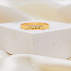 Minimalist Name Ring,Custom Moms Name Ring,Silver Ring,Stacking Ring,Engraved Ring,Birthday Gifts,Personalized Gifts,Mothers Day Gifts D A I N T Y - N A M E - N E C K L A C E * Material: High Quality Solid Brass * Finish: Silver Plated ∙ 18K Gold Plated ∙ 18K Rose Gold Plated  H O W ∙ T O ∙ O R D E R * Choose color and size * Payment completed O T H E R ∙ I N F O R M A T I O N * All jewelry come in a beautiful jewelry box, perfect for gift giving. * If you have any questions or need some advice Name Rings Silver, Independence Day Greetings, Name Ring, Engraved Ring, Personalized Anniversary Gifts, Birthday Ring, Ring Stacking, Gifts Personalized, Moissanite Wedding Bands