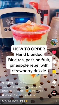 an image of a frozen drink being served in a blender with the caption how to order hand blended blue rass, passion fruit pineapple rebel with strawberry drizze